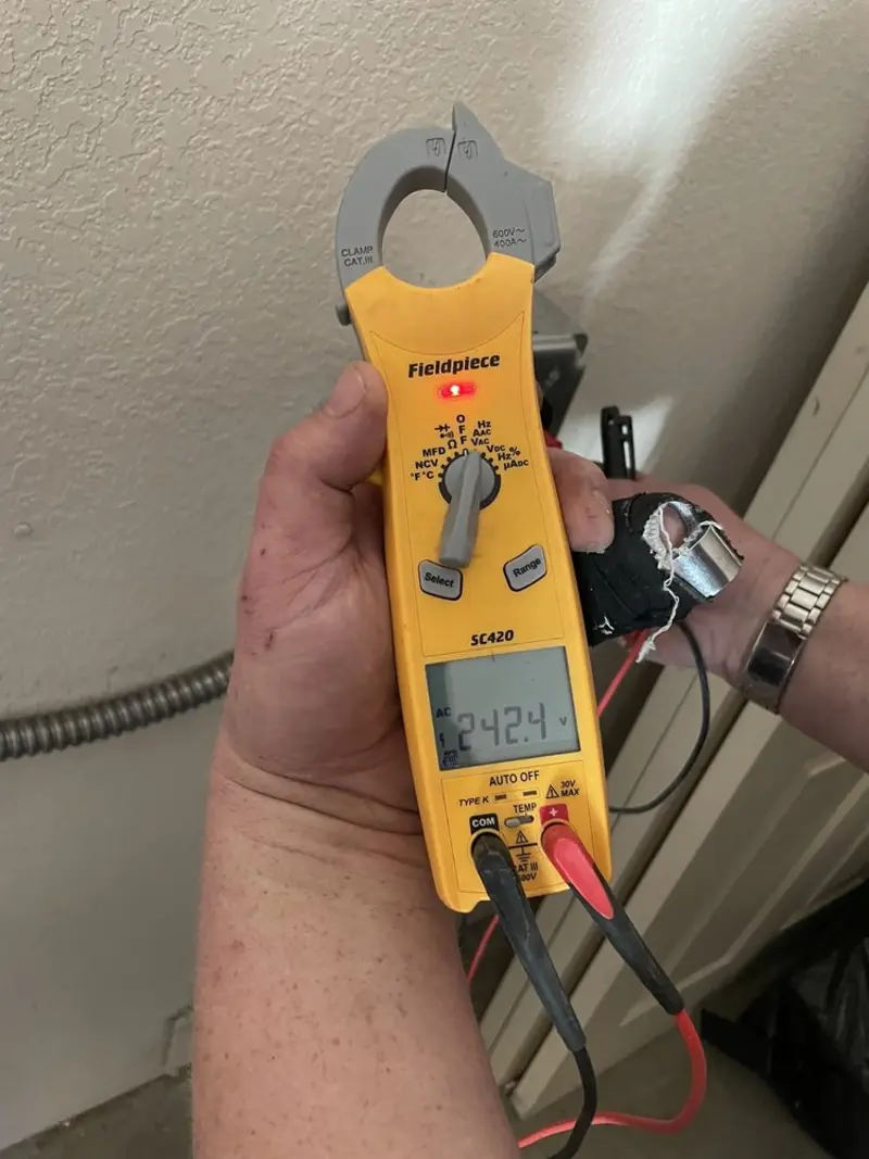 Voltage testing with clamp meter during Recessed Lighting Installation in Pocahontas